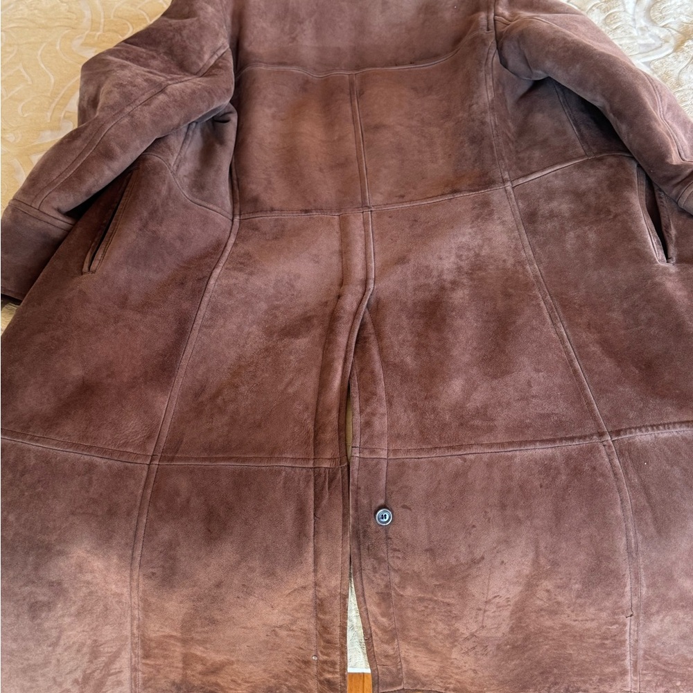 Luxurious full length shearling coat.